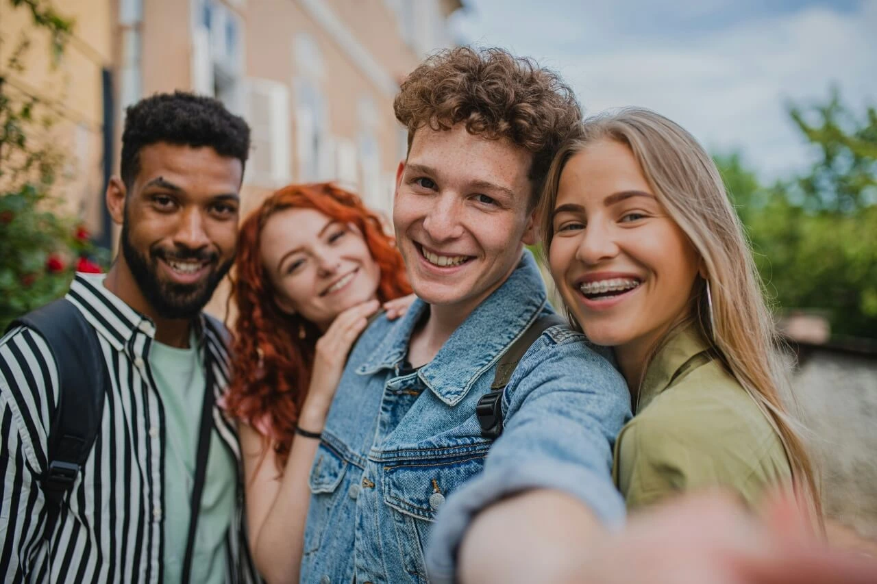 Group of older children taking a selfie